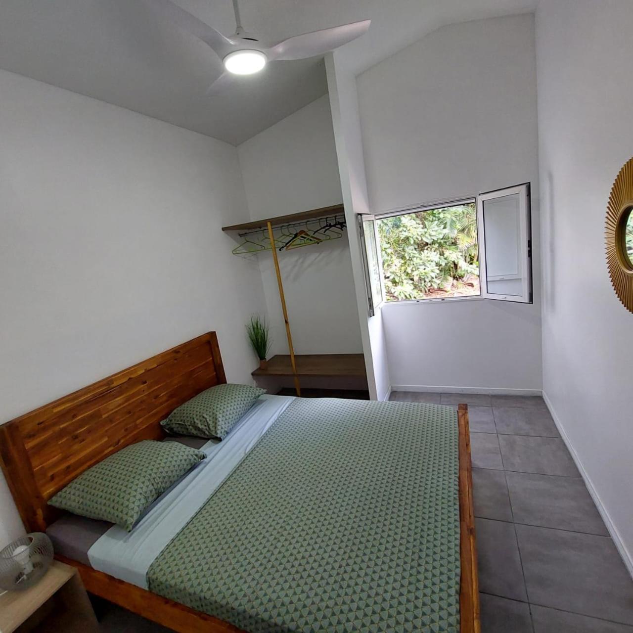 Villa L'avocat avec piscine chauffée et jacuzzi à Le Tampon Extérieur photo